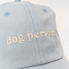Lucy &amp; Co. &quot;Dog Person&quot; Baseball Hat - Blue (One Size)